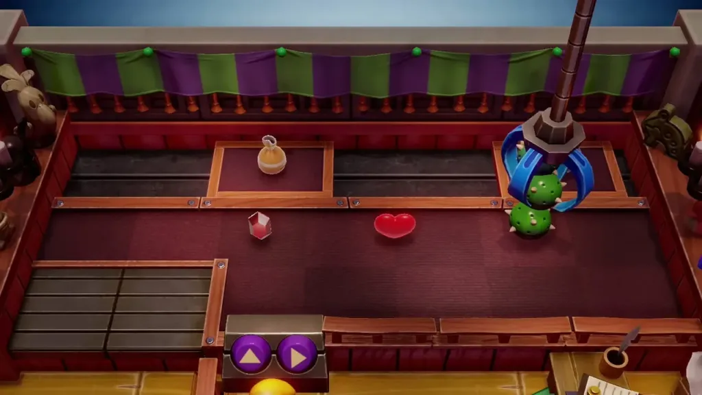 The crane claw lifting a green figure in the Trendy Game The crane claw lifting a green figure in the Trendy Game