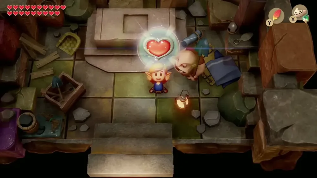Link lifting a Heart Container above his head in Dampé's Shack Link lifting a Heart Container above his head in Dampé's Shack
