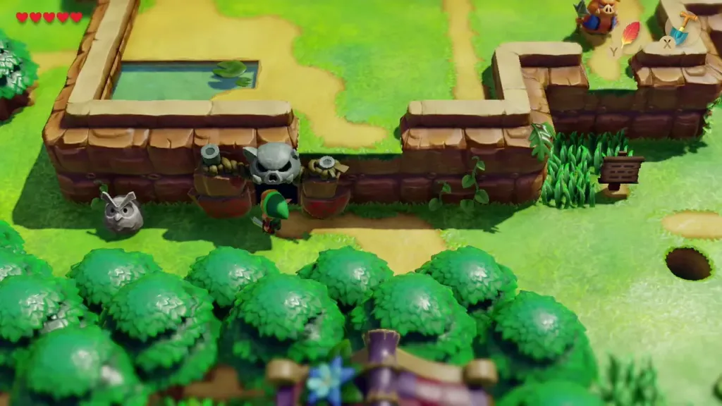 Link walking along a cliff wall on Tal Tal Heights toward a sign Link walking along a cliff wall on Tal Tal Heights toward a sign