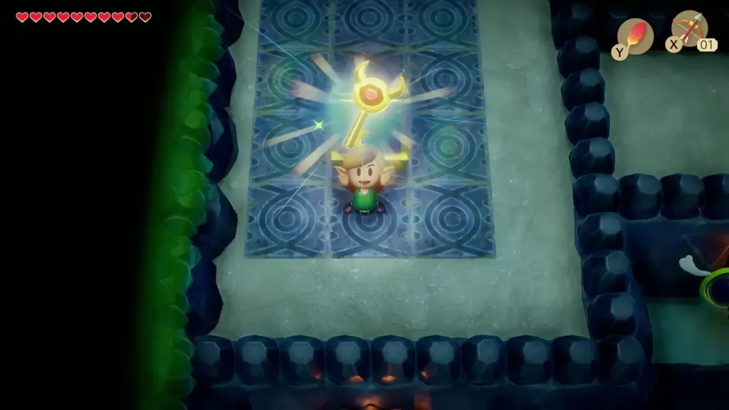 Link holding up the Nightmare Key with its message box in Angler's Tunnel