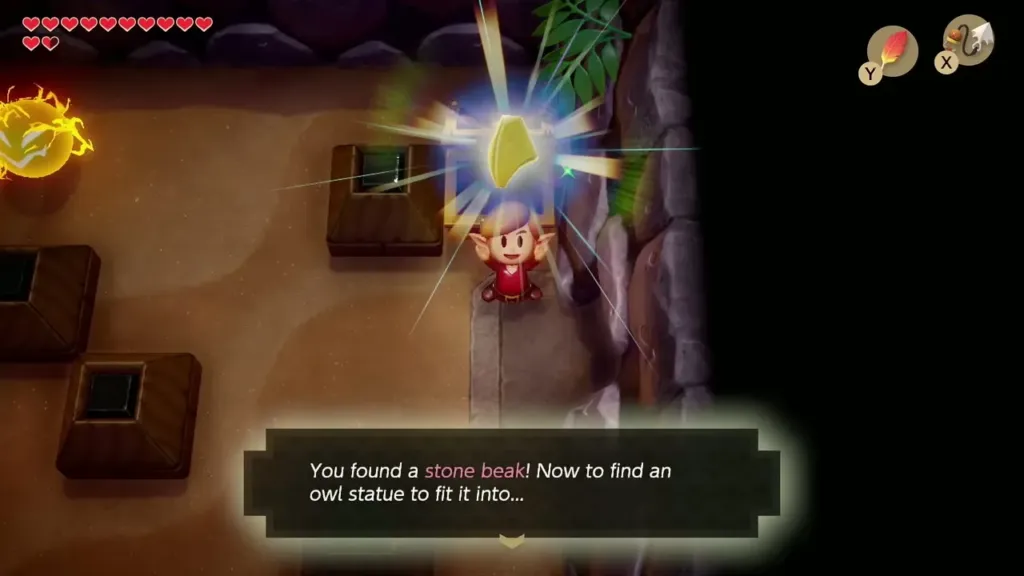Link holding up the Stone Beak with its message box in Catfish's Maw