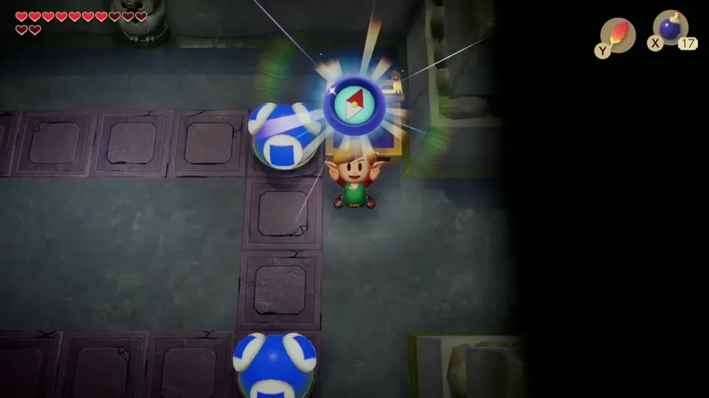 Link holding up the Compass in the Color Dungeon