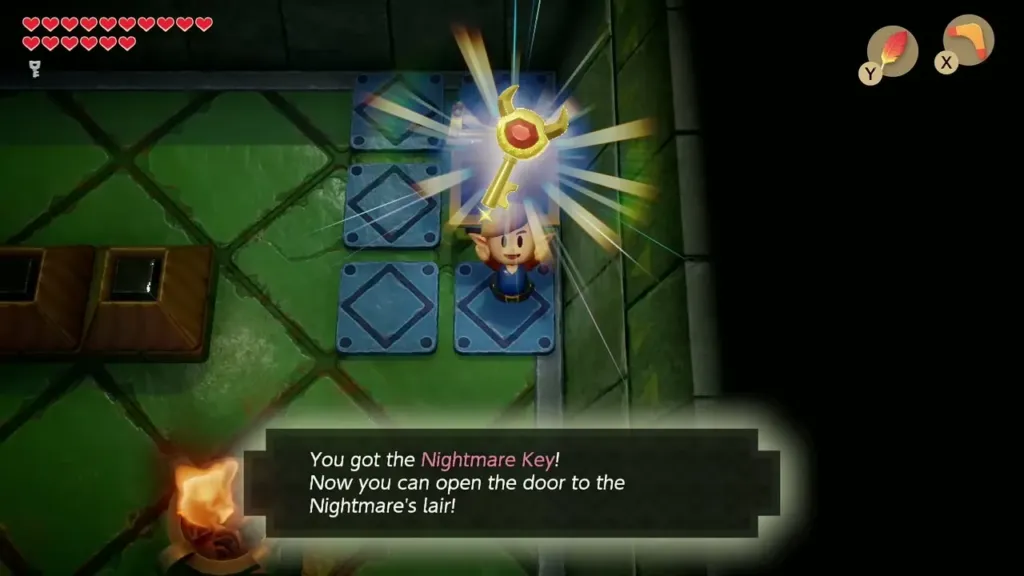 Link holding up the Nightmare Key with its message box in Eagle's Tower