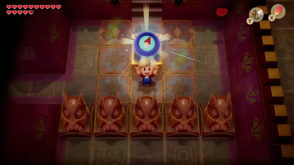 Link holding up the Compass in Face Shrine