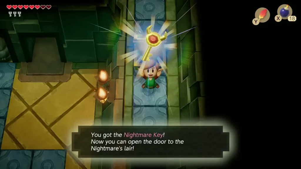 Link holding up the Nightmare Key with its message box in Key Cavern
