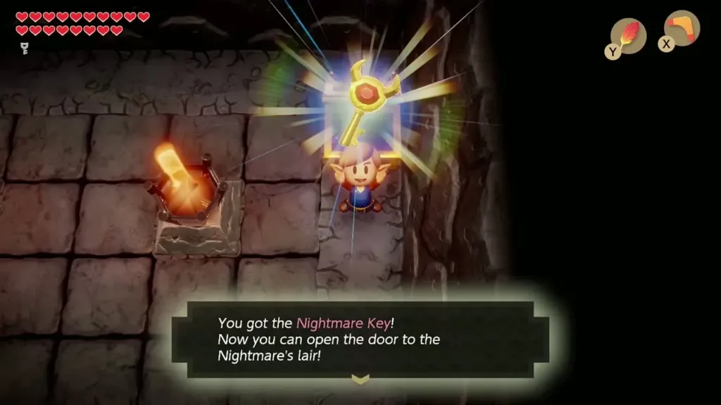 Link holding up the Nightmare Key with its message box in Turtle Rock
