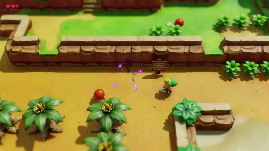Link with the Sword drawn near Red Octoroks along the beach path Link with the Sword drawn near Red Octoroks along the beach path