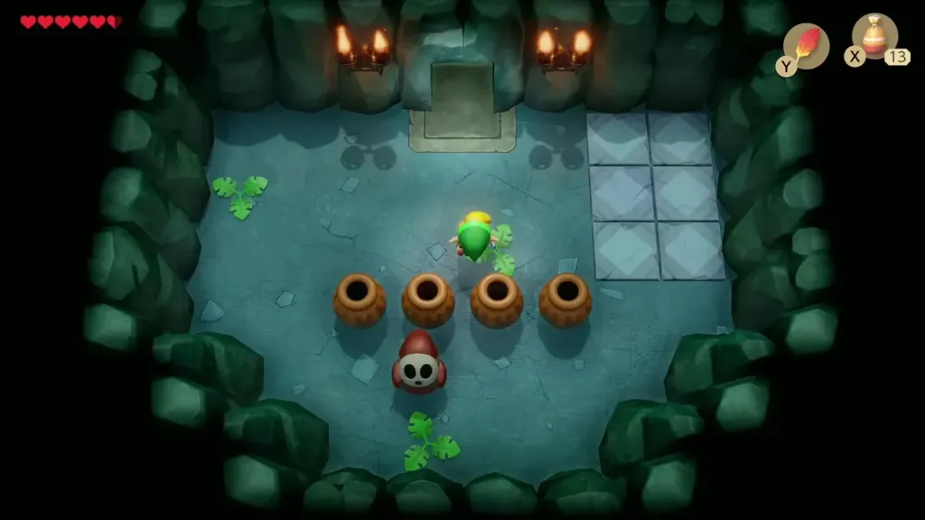 Link in a Bottle Grotto room with a Mask-Mimic below a row of pots Link in a Bottle Grotto room with a Mask-Mimic below a row of pots