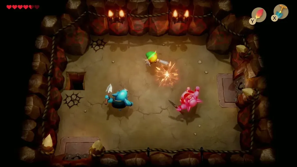 Link slashing a pink Moblin while a blue Moblin closes in Link slashing a pink Moblin while a blue Moblin closes in