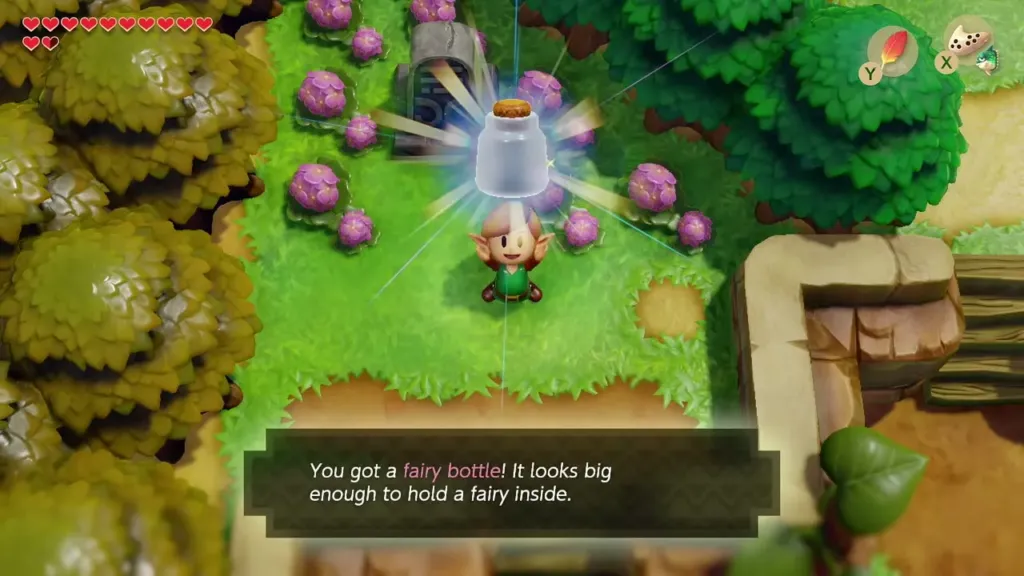 Link holding up the fairy bottle at the flowered grave with its message shown in full Link holding up the fairy bottle at the flowered grave with its message shown in full