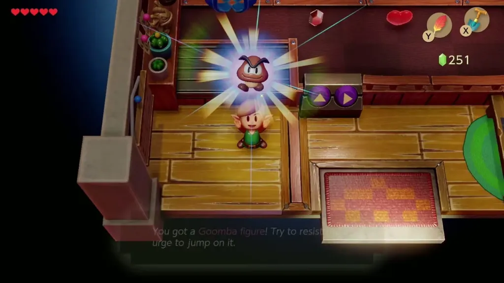 Link holding up the Goomba figure with the item message fading in Link holding up the Goomba figure with the item message fading in