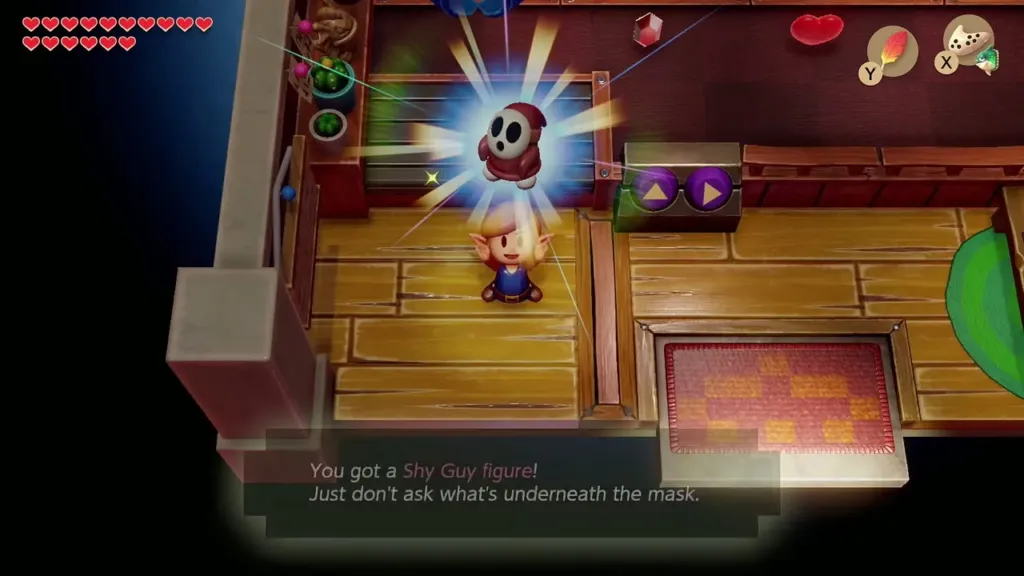 Link holding up the Shy Guy figure with its message box shown in full Link holding up the Shy Guy figure with its message box shown in full