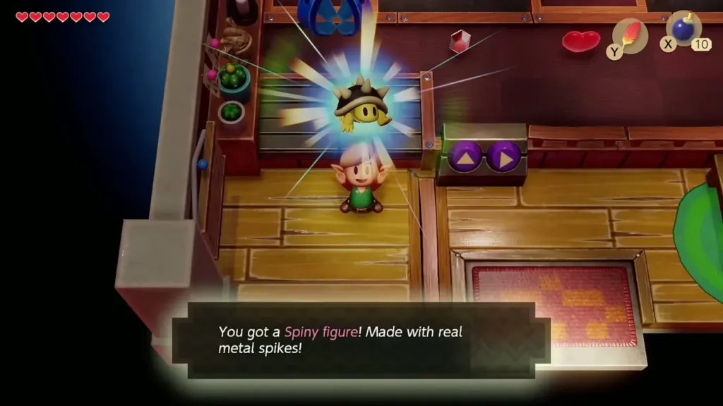 Link holding up the Spiny figure with its message box shown in full Link holding up the Spiny figure with its message box shown in full