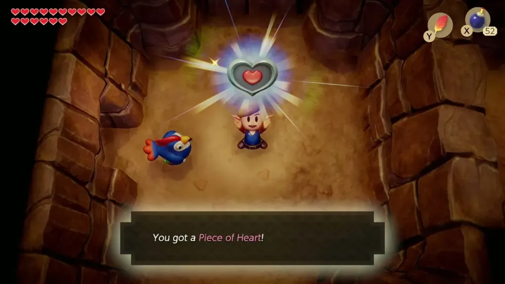 Link holding up a Piece of Heart in the cave