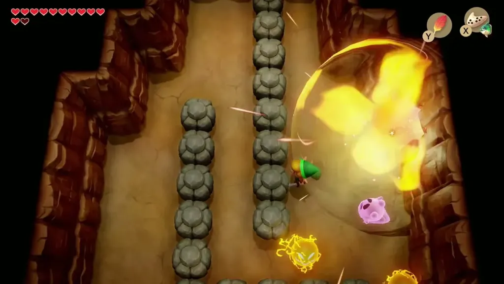A bomb exploding against the cracked wall in the cave corridor