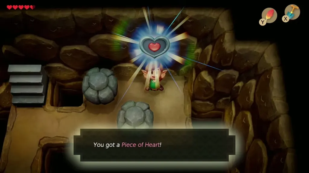 Link holding up the Piece of Heart in the cave with the item box