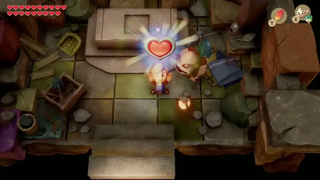 Link raising a glowing Heart Container beside Dampe