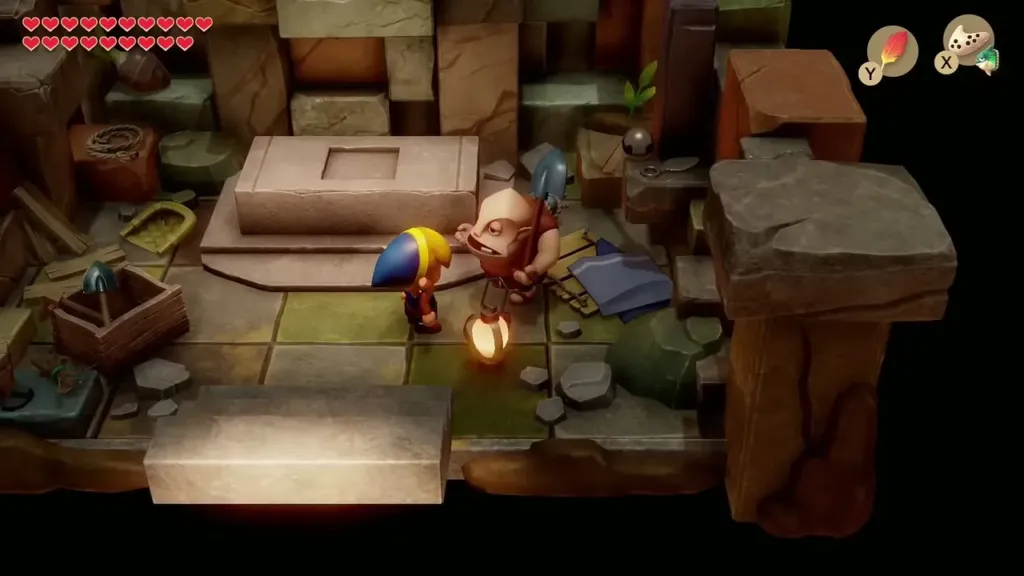 Link standing beside Dampe in his shack