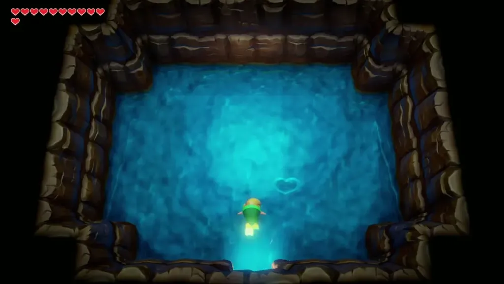 Link diving in the flooded cave with the Piece of Heart ripple ahead