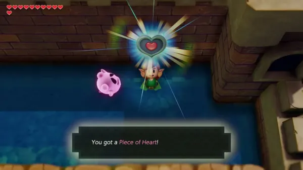 Link holding up a Piece of Heart in the moat with the item text box