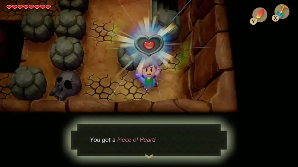 Link holding up a Piece of Heart with the item message shown