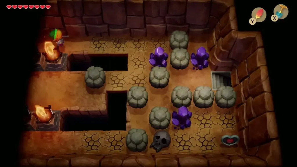 Purple crystals and rocks in the Tal Tal cave with a Piece of Heart on the floor