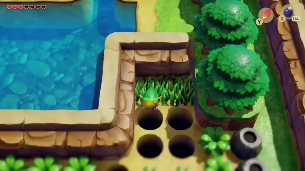 Link reaching the grass patch past the holes where the heart sits