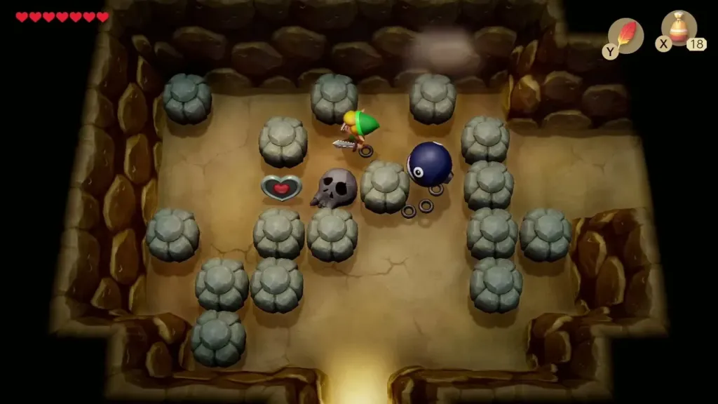 Link lifting a skull in the rock cave to clear the way to the heart
