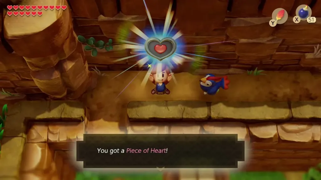 Link holding up a Piece of Heart on a narrow ledge