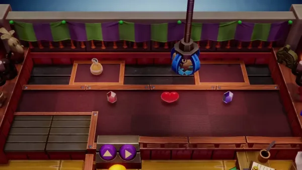 The claw lifting a prize from the top platform of the Trendy Game