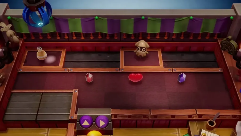 The Trendy Game claw at the top of the prize area before a play