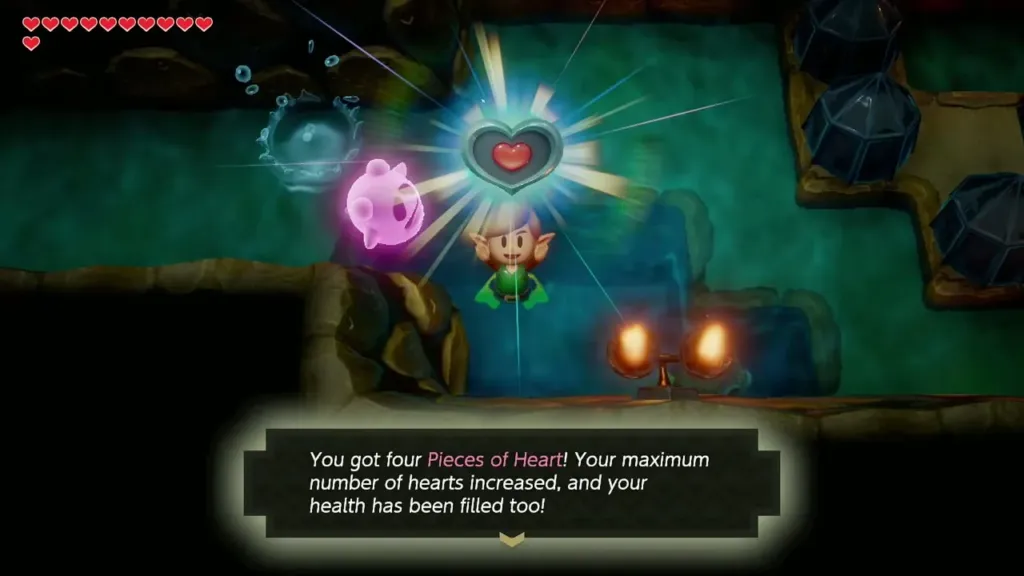 Link holding up the fourth Piece of Heart with the heart container text box