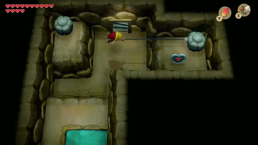 Link Hookshotting across the stones toward the Piece of Heart