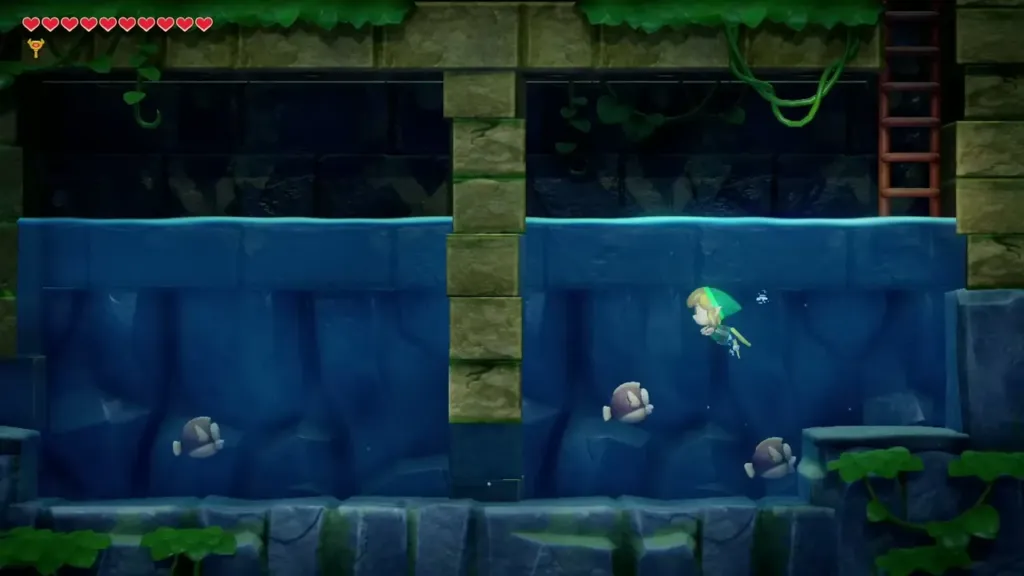 Link swimming underwater toward a ledge in Angler's Tunnel Link swimming underwater toward a ledge in Angler's Tunnel