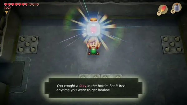 Link holding up a fairy in a bottle with the message about catching it Link holding up a fairy in a bottle with the message about catching it