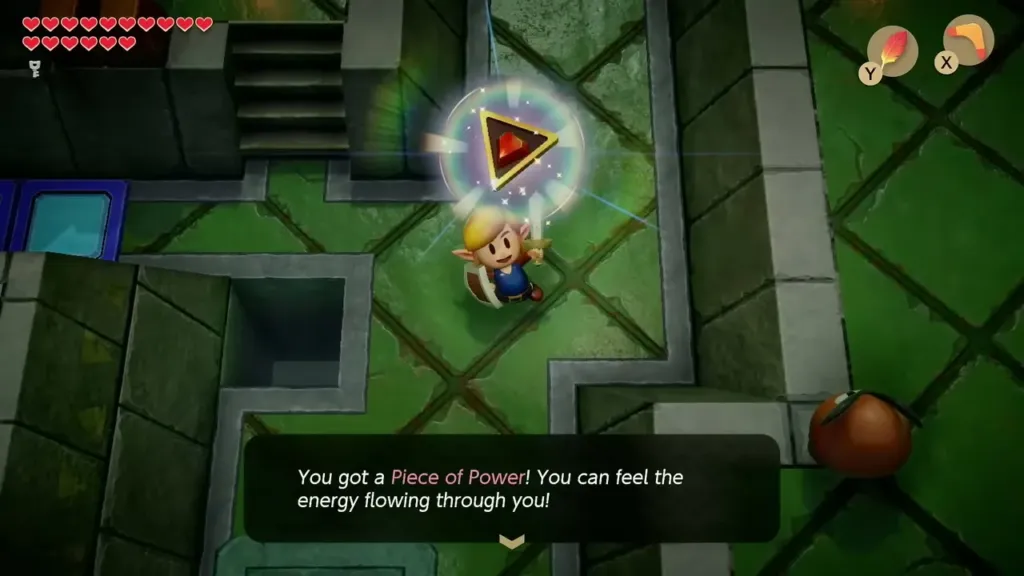 Link holding up the Piece of Power with its name box in Eagle's Tower Link holding up the Piece of Power with its name box in Eagle's Tower