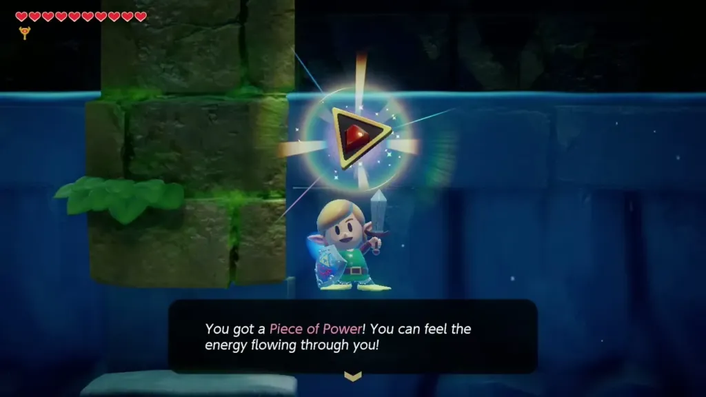 Link holding up the Piece of Power underwater with its name box Link holding up the Piece of Power underwater with its name box