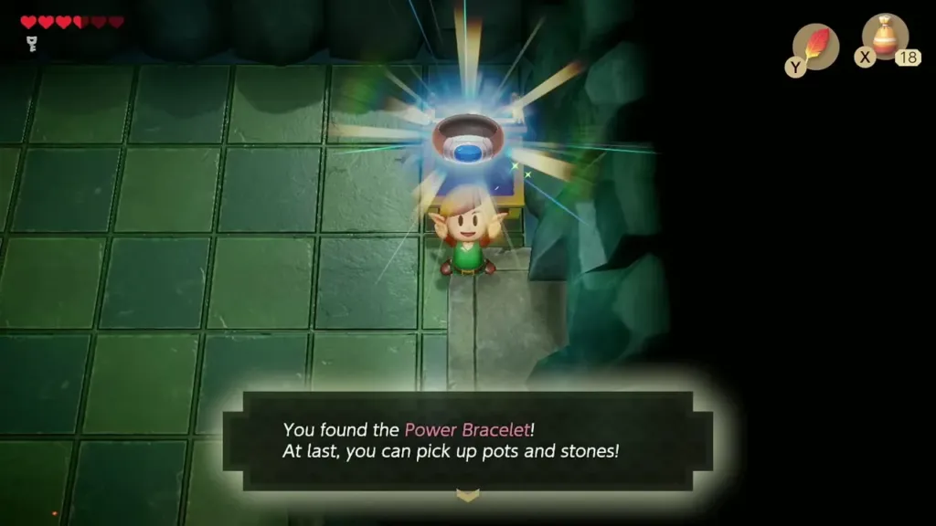 Link holding up the Power Bracelet with its name box in Bottle Grotto Link holding up the Power Bracelet with its name box in Bottle Grotto