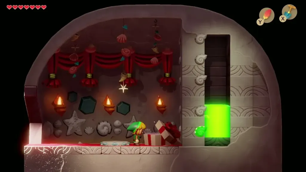 The present box opened beside Link in the Seashell Mansion The present box opened beside Link in the Seashell Mansion