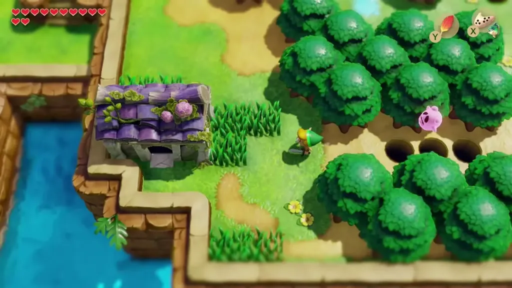 The Ghost's House beside the cliff with the pink ghost nearby The Ghost's House beside the cliff with the pink ghost nearby