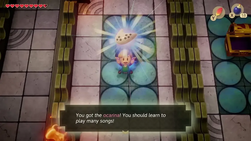 Link holding up the Ocarina with its message box Link holding up the Ocarina with its message box