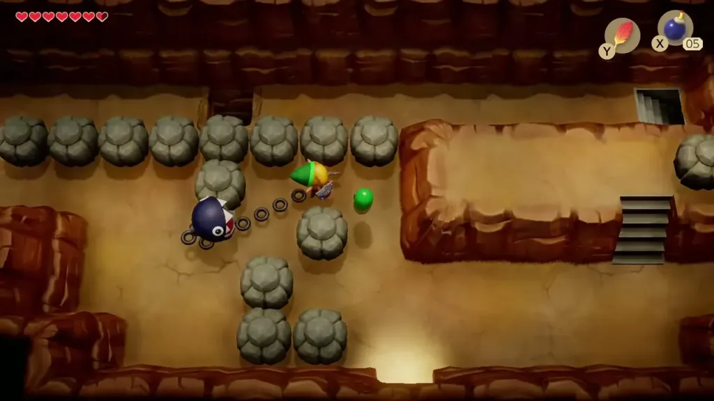 Link pushing the grey stones aside in the cave beside the stairs Link pushing the grey stones aside in the cave beside the stairs