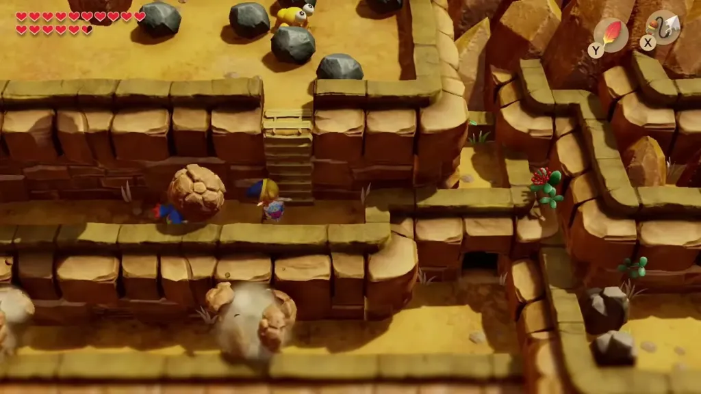 Stones tumbling down the cliff ledges toward Link Stones tumbling down the cliff ledges toward Link