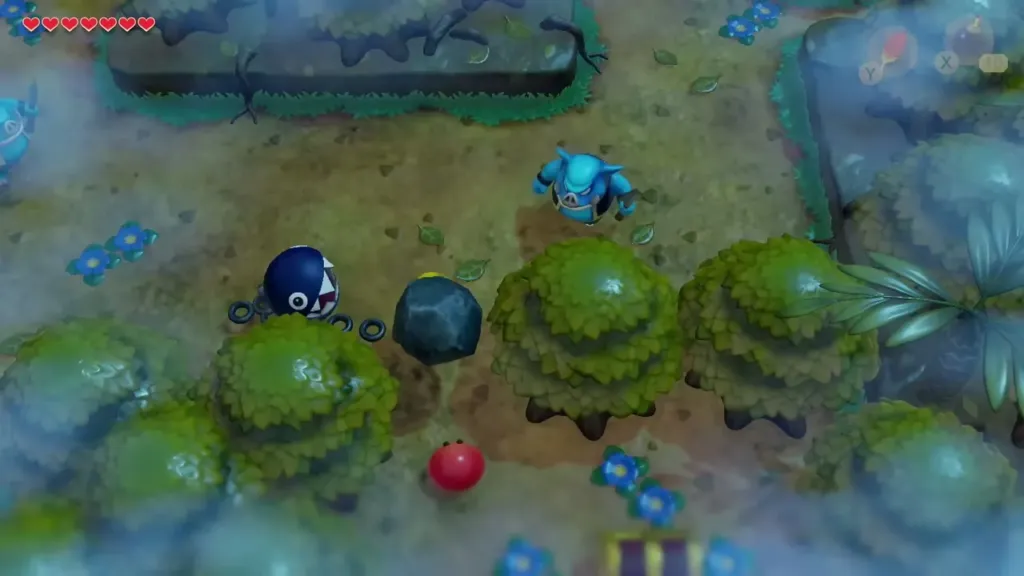 Link and BowWow beside a heavy boulder in the western Mysterious Forest Link and BowWow beside a heavy boulder in the western Mysterious Forest