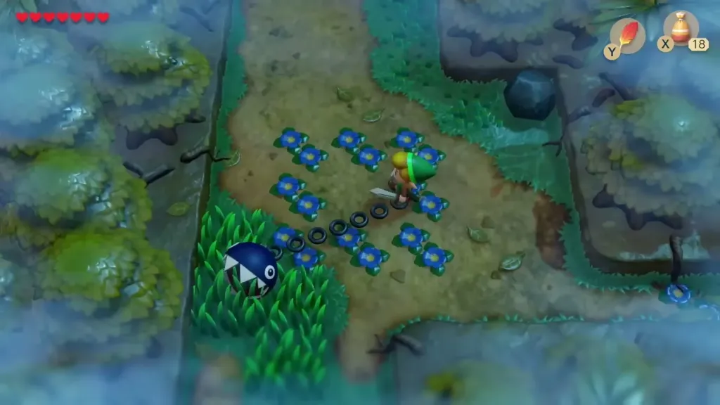 Link in the Mysterious Forest clearing ringed with blue flowers Link in the Mysterious Forest clearing ringed with blue flowers