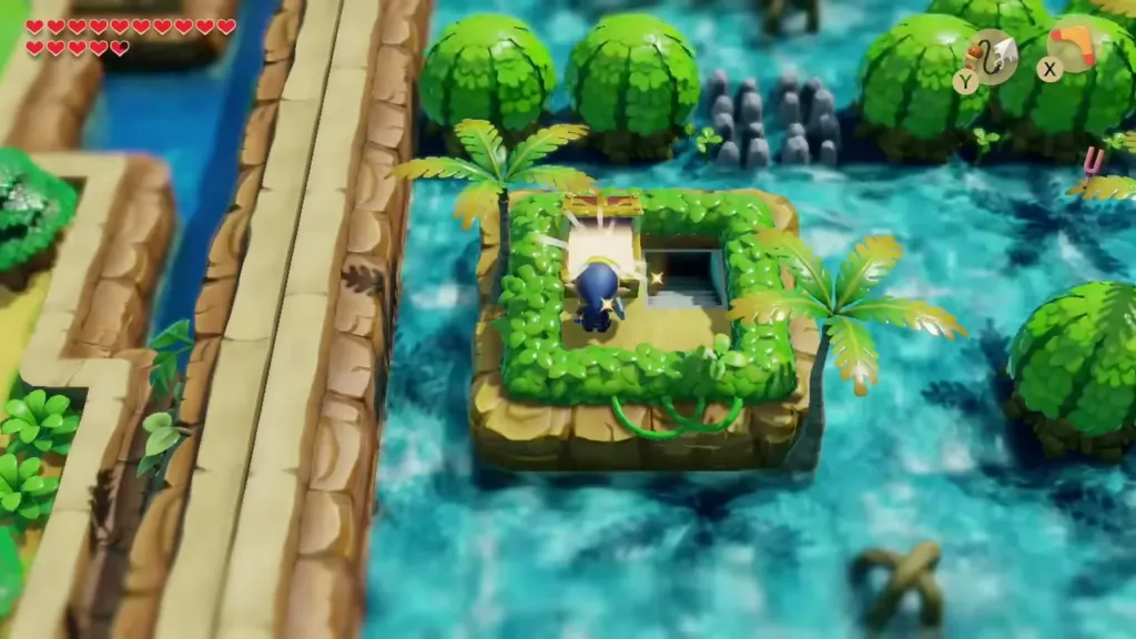 Link on the hedged island in the Rapids Ride beside the opened chest and stairs Link on the hedged island in the Rapids Ride beside the opened chest and stairs