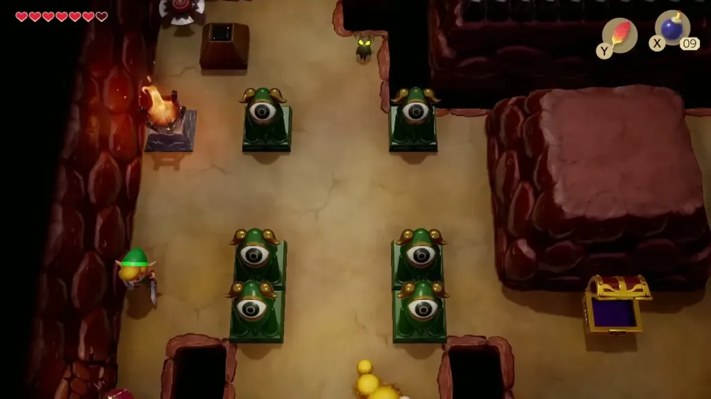 Link at the left wall of the long central room in Tail Cave with a bomb ready Link at the left wall of the long central room in Tail Cave with a bomb ready