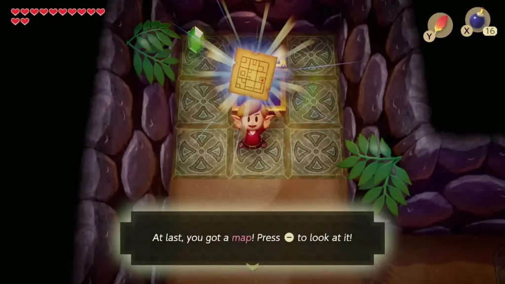 Link holding up the Dungeon Map above the opened chest with the message that he got the map Link holding up the Dungeon Map above the opened chest with the message that he got the map