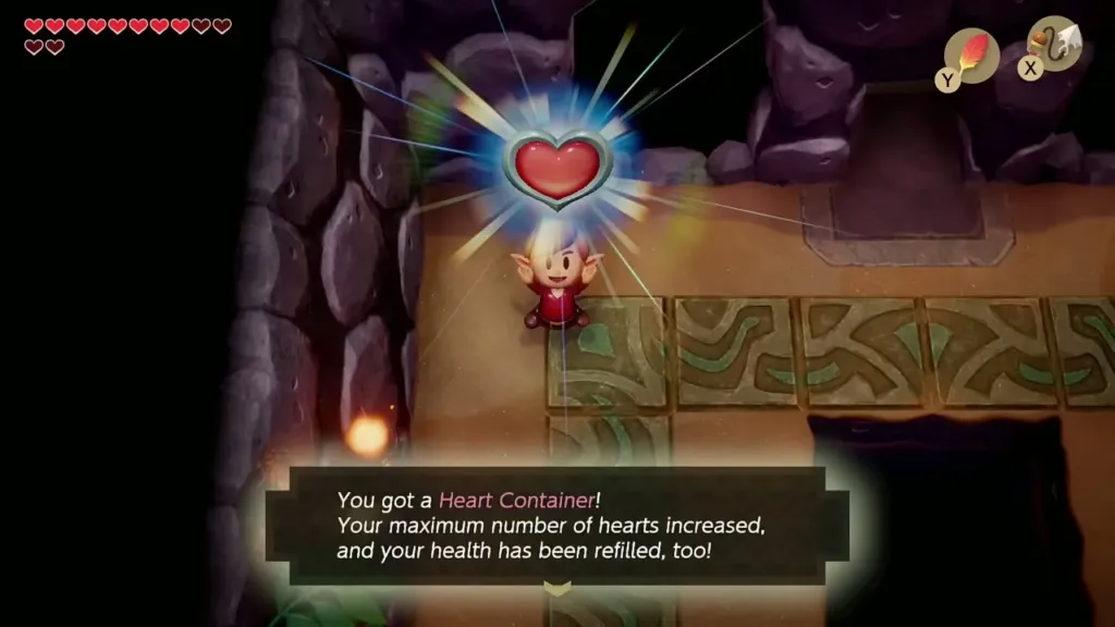 Link holding up a Heart Container with its message box Link holding up a Heart Container with its message box