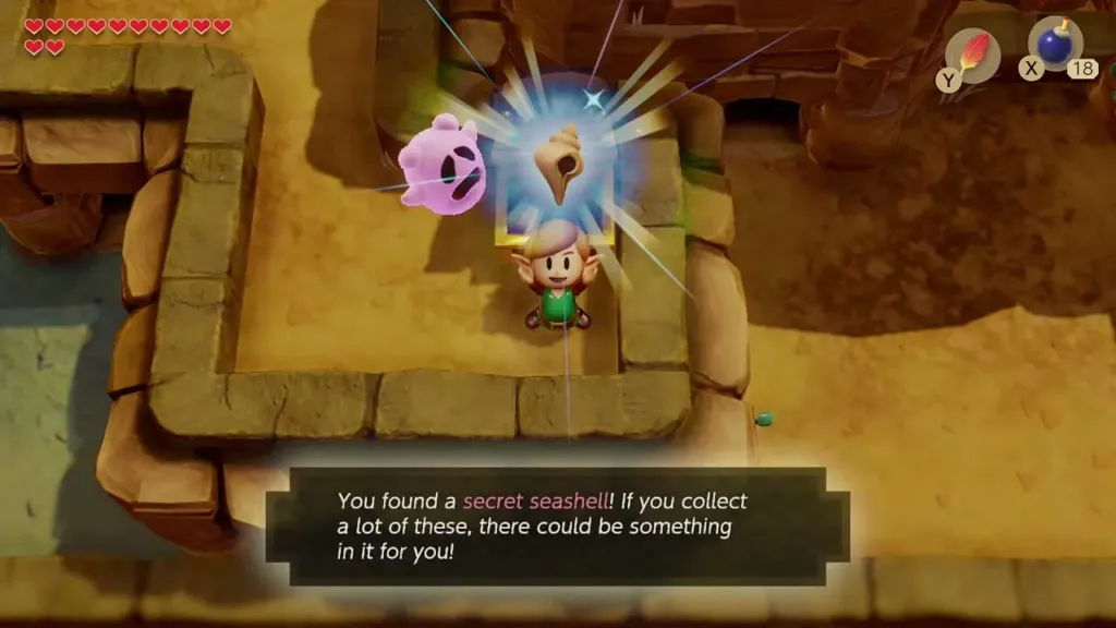 Link holds up the Secret Seashell from the ledge chest with the found-a-secret-seashell message box Link holds up the Secret Seashell from the ledge chest with the found-a-secret-seashell message box